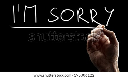 Mel hand writing I\'m sorry on black virtual screen. Conceptual of regret and expressing condolences.