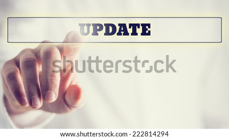 Close up Human Hand Pointing Update Text in Transparent Box, Isolated on White Background.