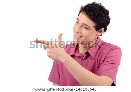 Man pointing. Young business man pointing to the side. Isolated on white background.