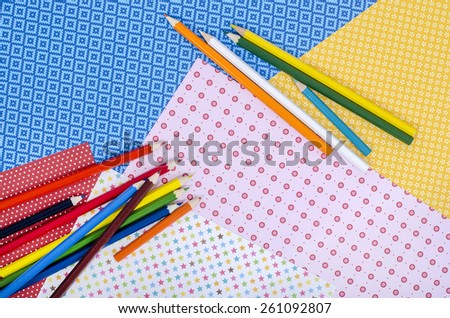 Arts and craft supplies.  Color craft paper and color pencils.