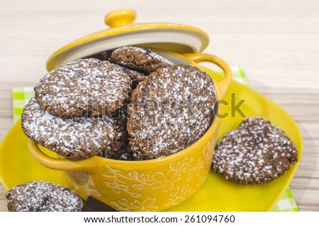Chocolate chip cookies. Delicious home made cookie in a yellow bowl.