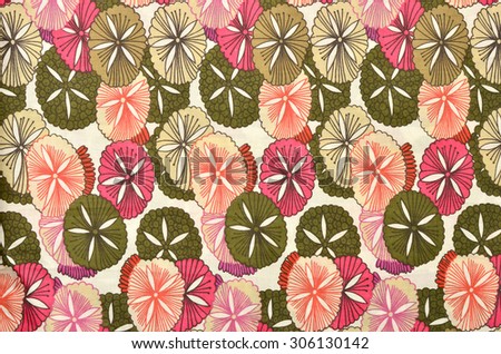 Abstract floral pattern on white fabric. Circle flowers print as background.