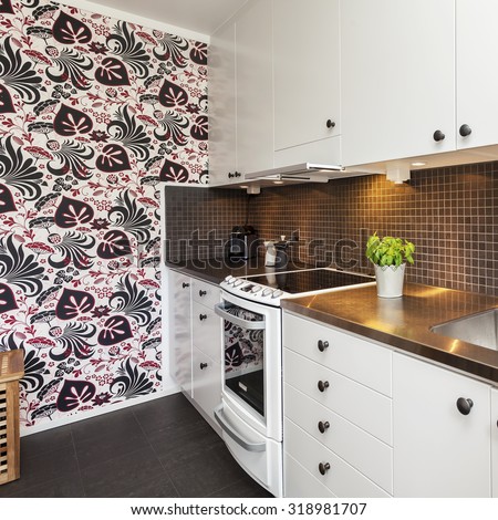 kitchen interior with modern wallpaper