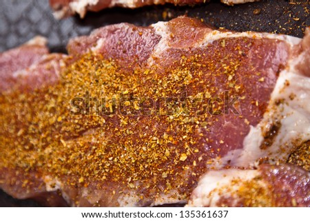 roasted pork neck steak in a pan