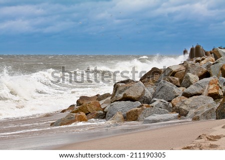 Big ocean wave breaking the shore