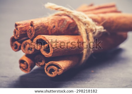 Bunch of cinnamon sticks. vintage photo