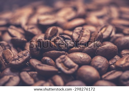 Coffee beans on wooden background. vintage food photo
