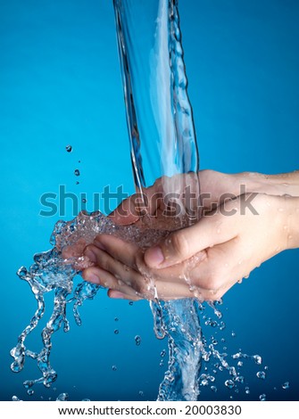 Hands and stream of water. Very high resolution.