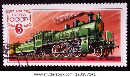 USSR- CIRCA 1979: A stamp printed in USSR shows a working green train on a rails, circa 1979.