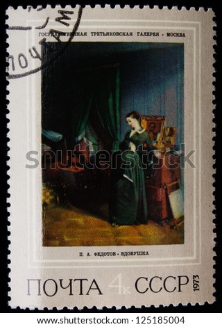 USSR- CIRCA 1973: A stamp printed in USSR shows a picture of a young widow in The State Tretyakov Gallery, circa 1973.