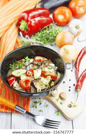 Baked vegetables, vegetarian food in a bowl on the table