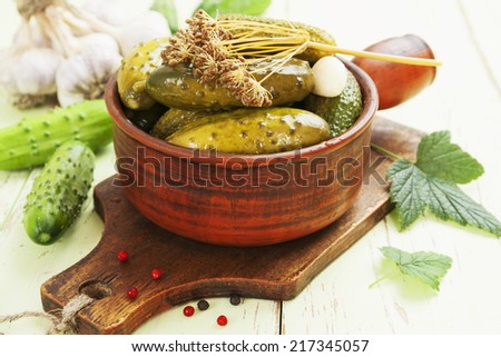 Pickles in a ceramic pot on the table