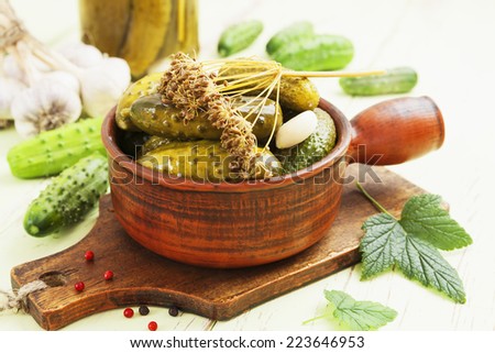 Pickles in a ceramic pot on the table