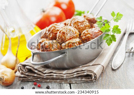Meatballs in tomato sauce in the pan