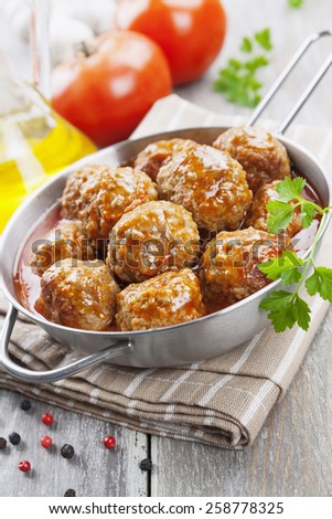 Meatballs in tomato sauce in the pan