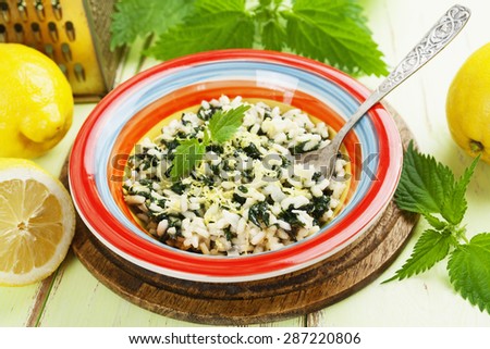Risotto with nettles and lemon  in the ceramic plate
