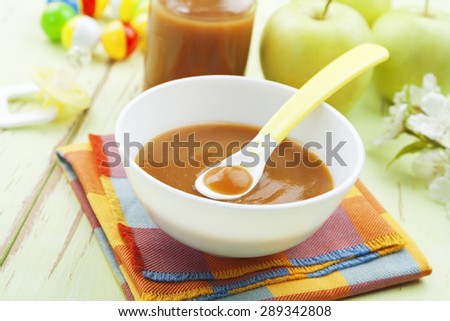 Apple puree in a bowl on the table