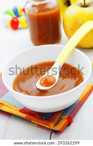 Apple puree in a bowl on the table