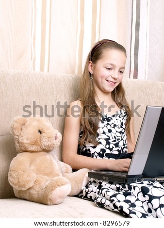 Young girl using a laptop. Computer generation