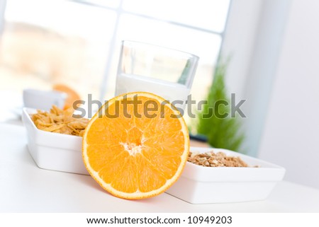 Orange, cornflakes and milk /Fast and delicious breakfast