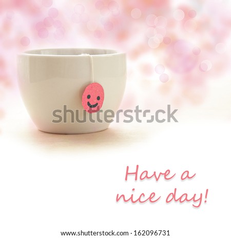 Smile tea bag in the cup with \