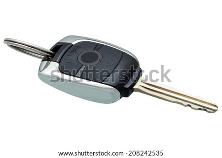 The automobile chip a key, a car key with remote management of opening and closing of doors of black color on a white background, nobody.