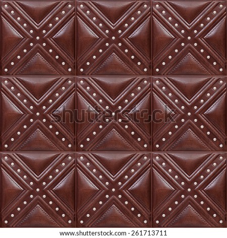 Tile leather for a room decor, a tile with volume drawing and texture of skin for internal finishing.