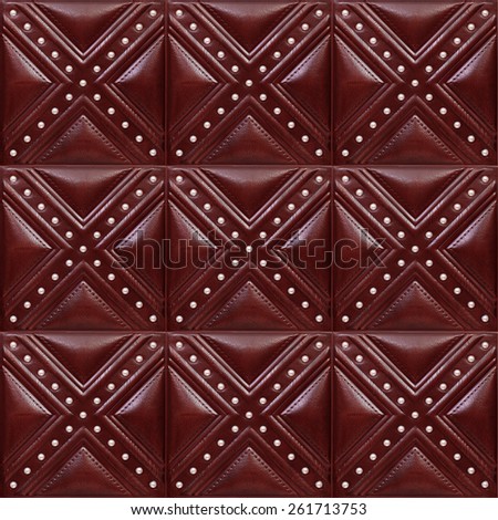 Tile leather for a room decor, a tile with volume drawing and texture of skin for internal finishing.