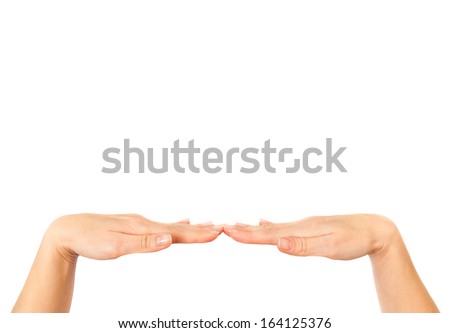 Female hands forming support for text