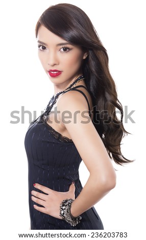beautiful asian woman with perfect skin posing on isolated background