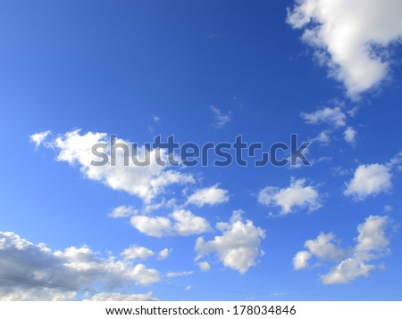 a view of a blue sky and white clouds / blue sky and white clouds