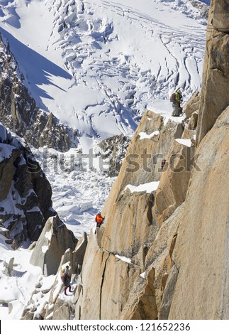team mountain climbers ,climb in ice mountain
