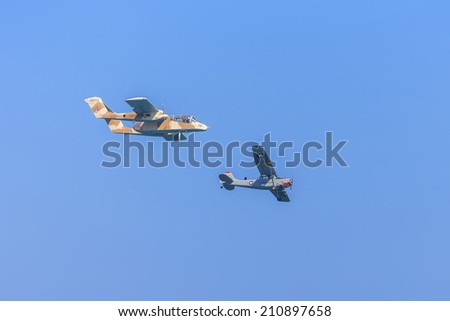 GIJON-SPAIN - JULY 27: North American Rockwell OV-10 Bronco &  Cessna L-19/O-1 Bird Dog during exhibition in IX AIR FESTIVAL on july 27, 2014 in Gijon,Spain.