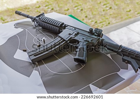 machine gun over training silhouette target