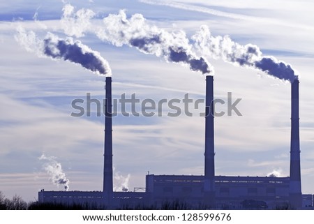 picture of factory pipes with smoke
