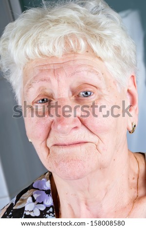 portrait of old smiling woman .
