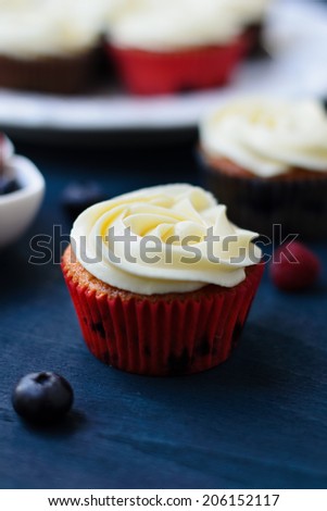 Lemon cupcakes with blueberry filled lemon curd and cream cheese frosting