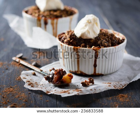 Pear and banana chocolate crumble with ice cream and caramel