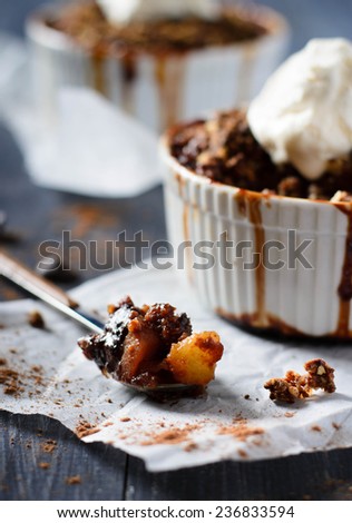 Pear and banana chocolate crumble with ice cream and caramel