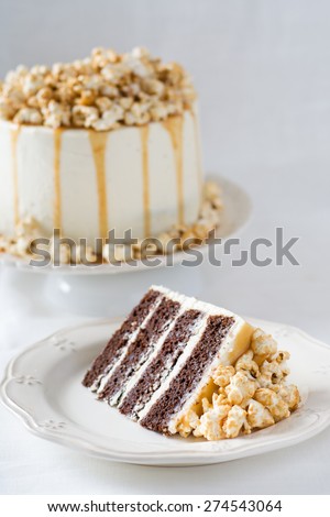 Chocolate cake with caramel and popcorn