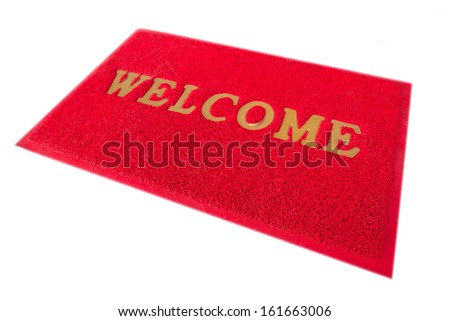 Red Welcome Mat Isolated On A White Background.