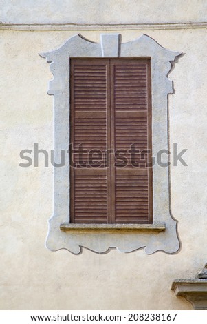 jerago window  varese palaces italy   abstract  sunny day    wood venetian blind in the concrete  brick