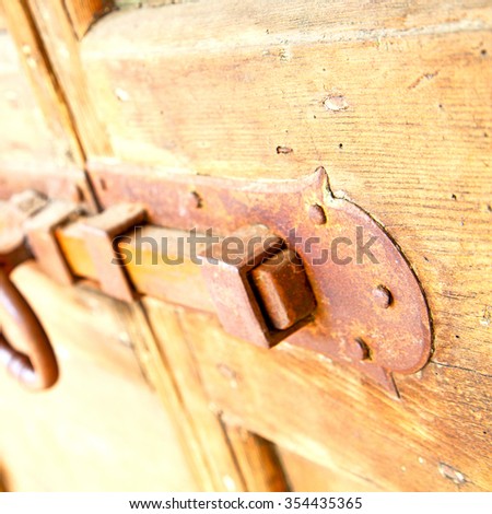 europe old in  italy  antique close brown door and rusty lock  closeup
