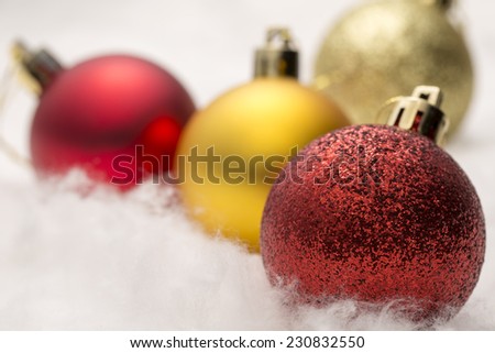 Red and gold Christmas baubles - Stock Image