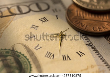 Time and Money. Clock in US dollars - Stock Image / Time is money.  Clock in US dollars