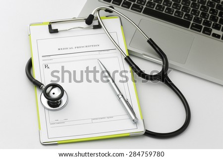 Laptop,Medical Record chart and Stethoscope