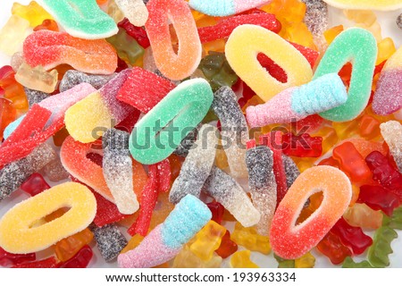 Kids gummy candies or sweets in multi colors and a variety of shapes.