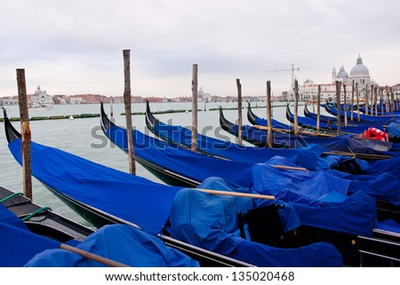 gondola boats pattern in  grand Canal, Venice, boat jetty, romantic evening in house boat