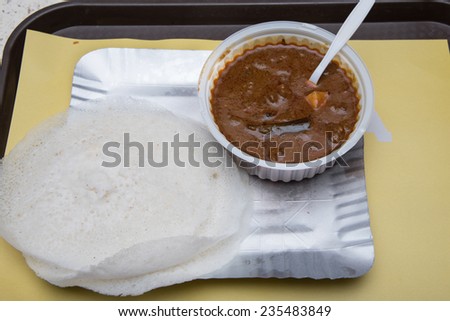 appam with beef curry Kerala India breakfast
