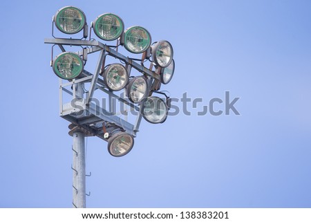 Small stadium lights during day used for amateur soccer games, field hockey, lacrosse, and other team sports